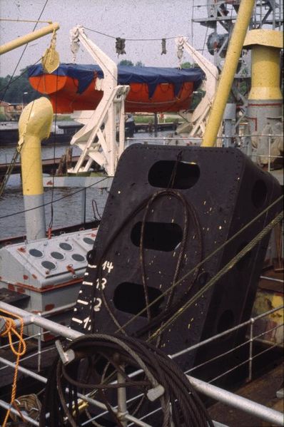 Datei:Fuehrungsgewicht Saugrohr.jpg